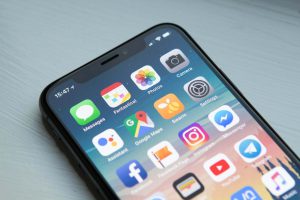 An iphone with various apps