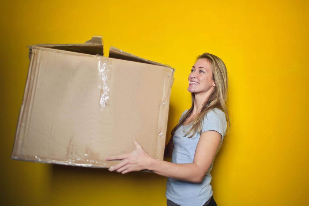 A woman making money helping people move.