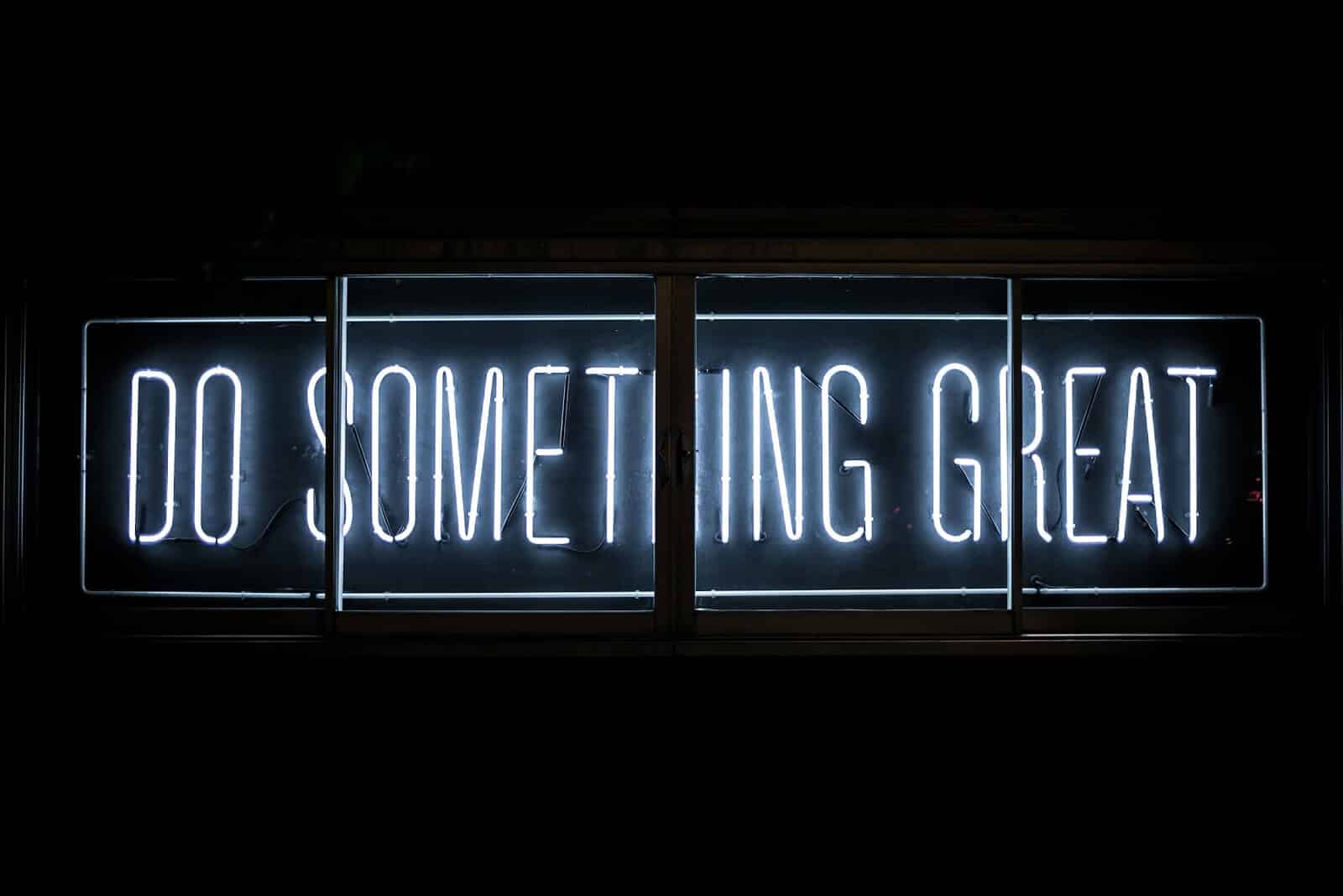 Neon sign that reads, "Do Something Great"