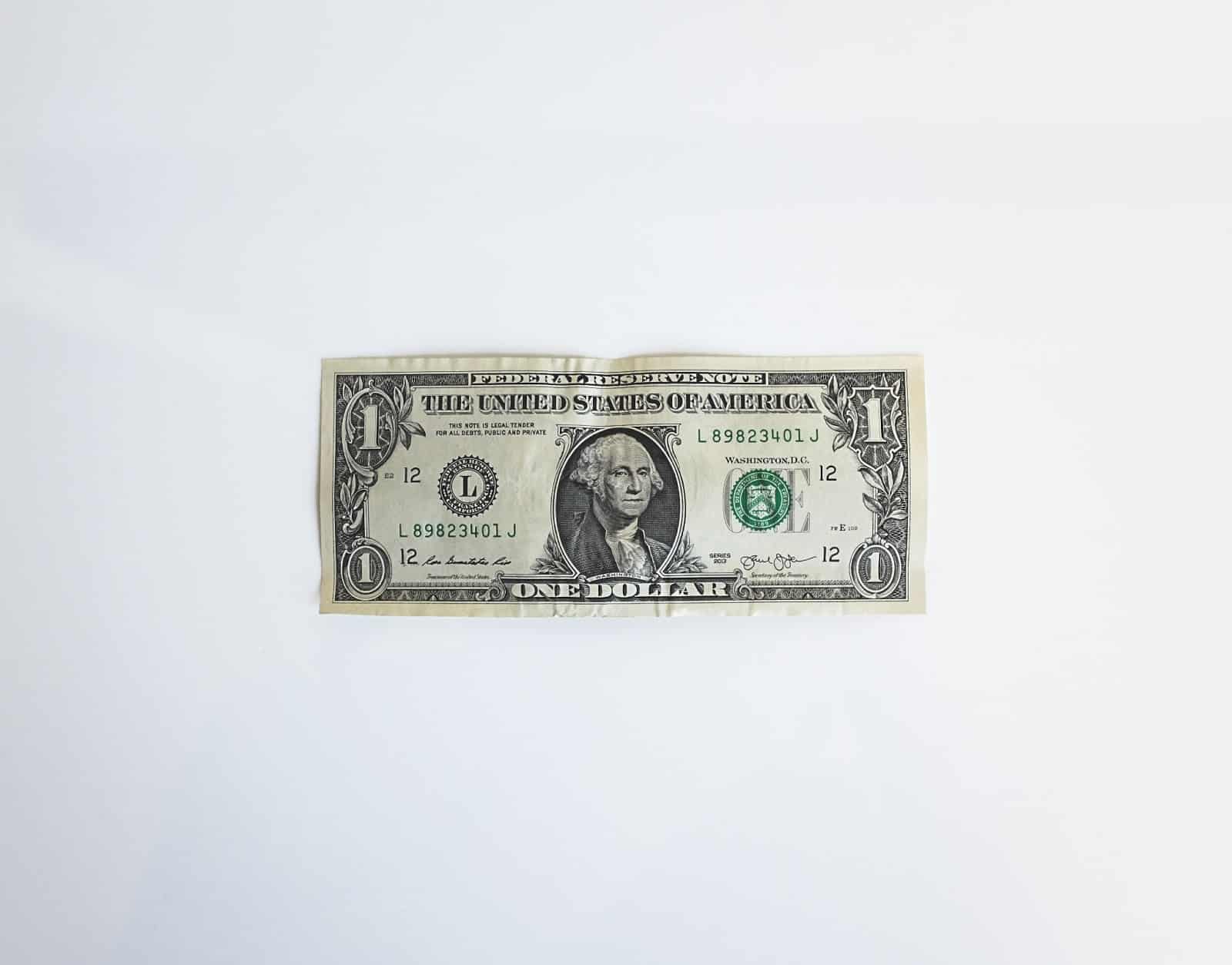 Stash app: one dollar bill on a white background