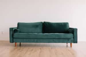 A velvet couch that could be sold on AptDeco